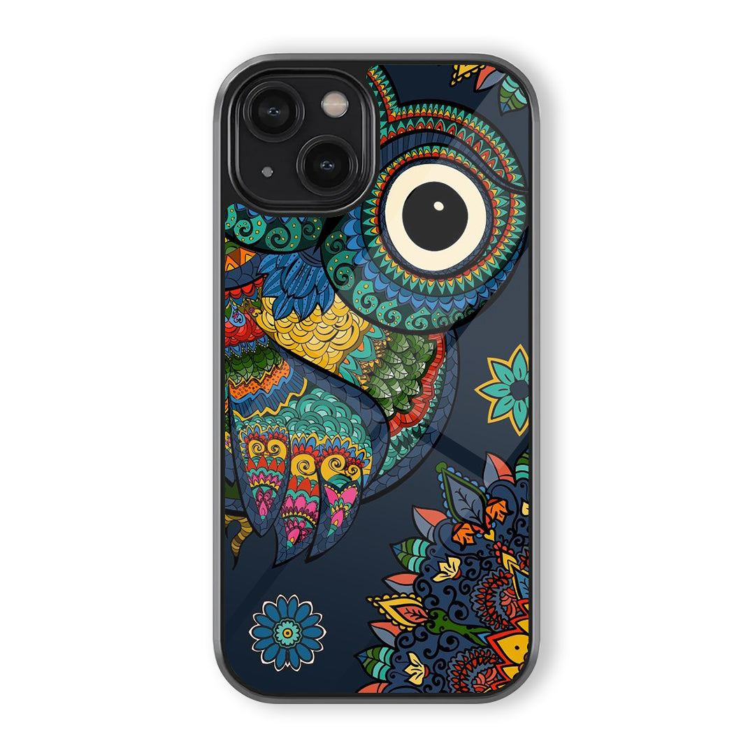 Mandala owl phone case with deep navy background, large owl eye, colorful patterned feathers, and floral decorative accents