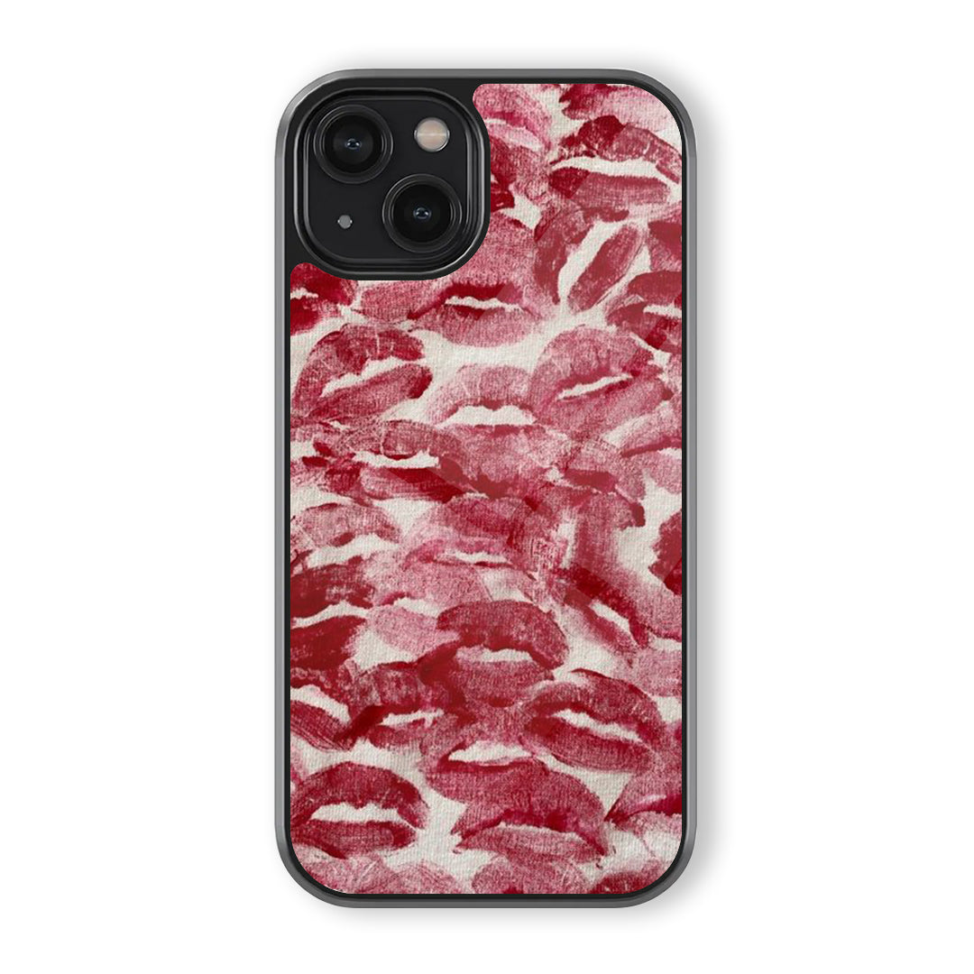 Red lipstick kiss print phone case with repeated lip marks over a textured pink and white background